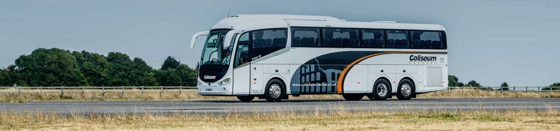 Coliseum coach driving past